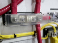 Installed Class T fuse block with heavy-duty red battery cables