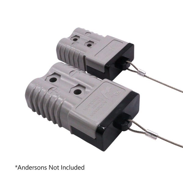 Two grey 120A Anderson plugs with black dust covers installed on the mating face
