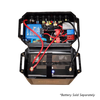 Open battery box lid showing internal wiring, Victron Orion XS charger and fuse layout