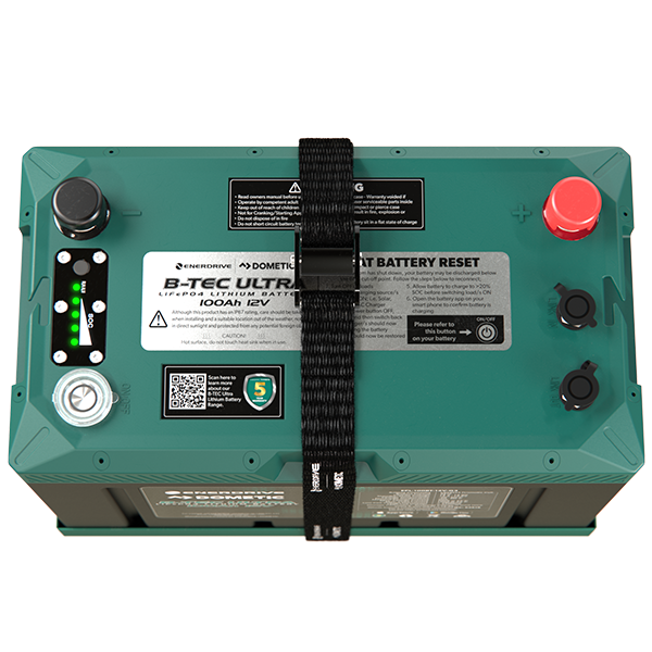 Overhead technical view of the battery showing terminals, SOC display, power button, and communication ports