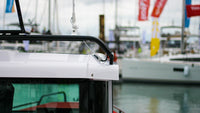 Grey Scanstrut cable seal mounted on the white roof of a boat