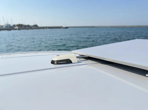 Marine installation of the horizontal cable seal on a boat roof near a flat panel