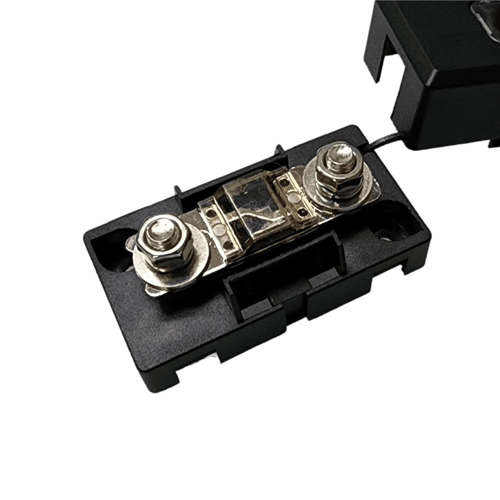 Close-up angled view of a MIDI fuse bolted securely onto the fuse holder base studs