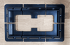 Overhead layout view of four corner brackets and two mid brackets arranged on a wooden surface