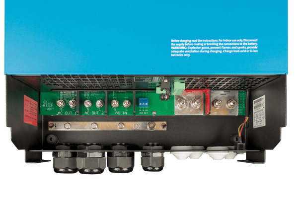 Internal connection bay showing M8 battery studs and AC wiring terminals