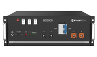 Front interface of a Pylontech US5000 48V rack-mounted lithium battery module showing ports and terminals