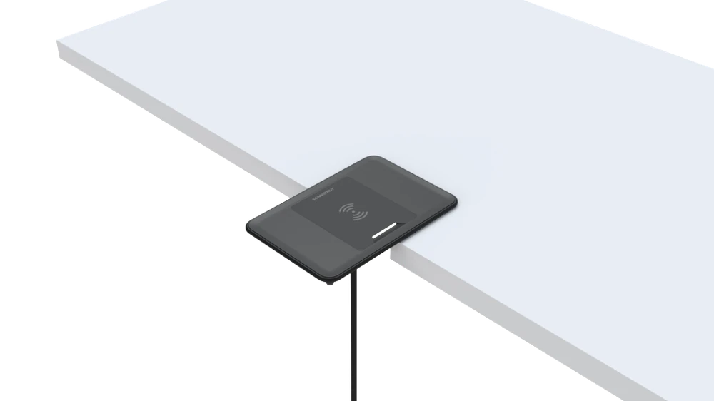 Cross-section render showing the charger recessed into a white dashboard surface