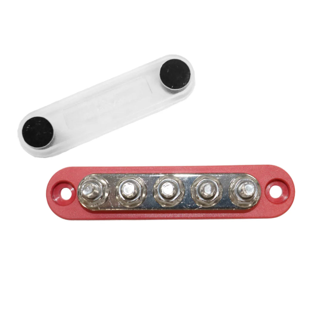 Top-down view of red 5-stud busbar with clear protective cover removed