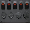Close-up of rocker switches and waterproof caps on 12V and USB sockets