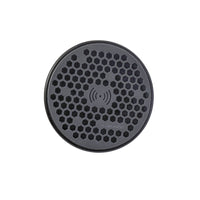Top-down view of round black waterproof wireless charger with honeycomb grip pattern