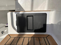 Installed Scanstrut ATMOS air pump station with the protective sun cover closed