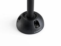 Black Scanstrut vertical cable seal with 21mm connector capacity and black cable on white background