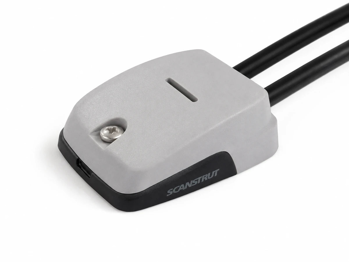 Scanstrut horizontal cable seal installed with two black cables exiting towards the rear