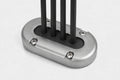 Aluminium vertical multi cable seal with four cables passing through a black rubber bung