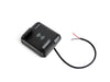 Angled view of Nano wireless charger showing integrated 12/24V power cable
