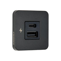 Three-quarter view of black Scanstrut TILE USB-A and USB-C socket