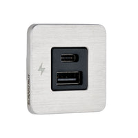 Angled view of square brushed stainless steel USB-A and USB-C charging socket
