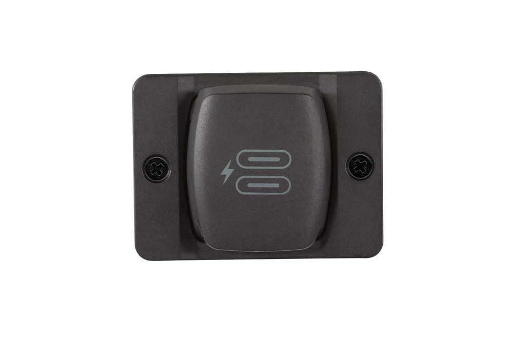 Charge socket installed into a rectangular surface-mount bezel with screw holes