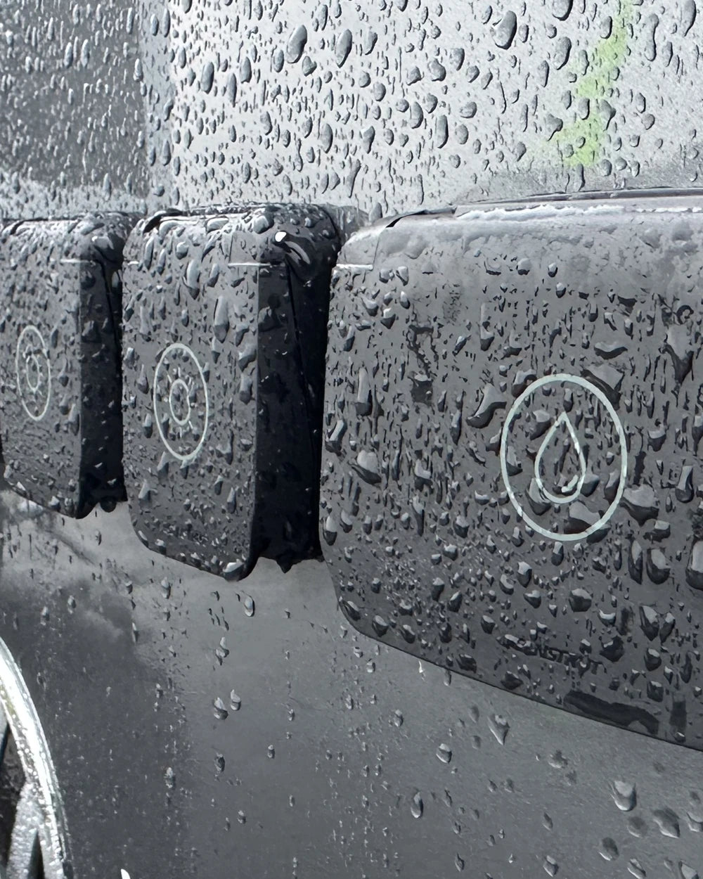 Three Scanstrut Ventura series outlets mounted on a vehicle in wet conditions