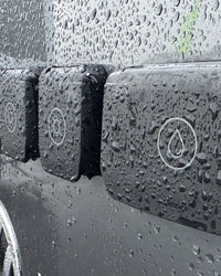 Three Scanstrut Ventura series outlets mounted on a vehicle in wet conditions