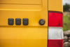 Three Scanstrut Ventura sockets mounted on the exterior of a yellow camper van