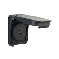 Angled view of the dual USB-C socket with the protective lid partially opened