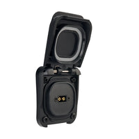 Three-quarter view of black Scanstrut solar input socket with open lid revealing internal XT60 connector