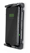 Profile view of a charging phone in a wall-mounted waterproof cradle