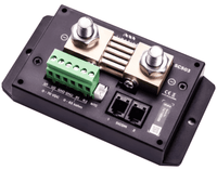Perspective view of a black battery shunt with gold-coloured terminals and a green 6-pin connector block