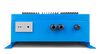 Bottom view of Skylla-IP65 charger showing cable glands and terminal block ports