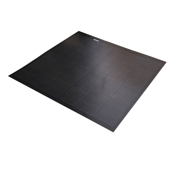 Angled view showing the thin profile of a black flexible solar panel