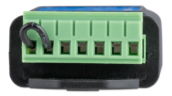 Close-up of the 7-way screw terminal block with a factory-installed remote loop wire