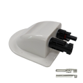 Angled view of white solar cable entry cover with integrated black connectors and loose crimp terminals