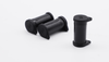 Three black solar connector caps arranged to show side profiles and the closed top with PK marking