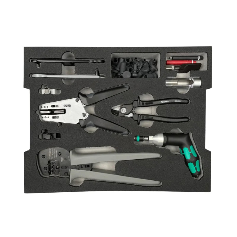 Top-down view of Stäubli MC4 toolset foam insert with crimping and stripping pliers