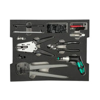 Top-down view of Stäubli MC4 toolset foam insert with crimping and stripping pliers