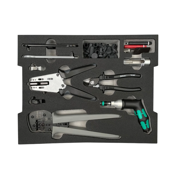 Top-down view of Stäubli MC4 toolset foam insert with crimping and stripping pliers