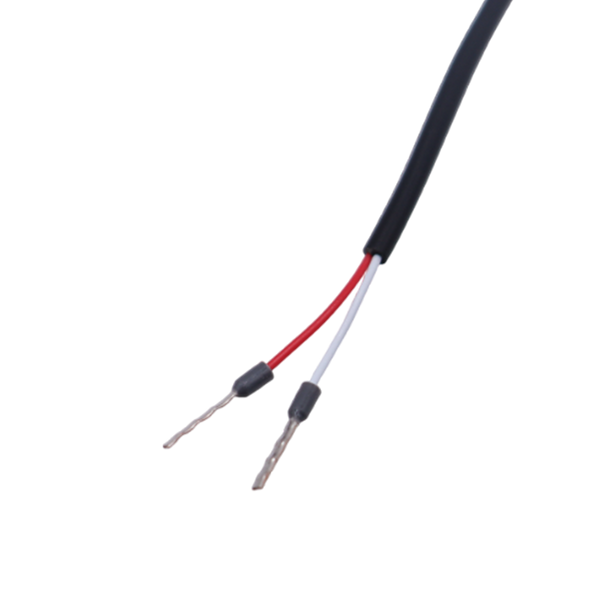 Close-up of red and white wire leads with stripped ends for connection