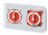 Two battery switches mounted on a grey panel demonstrating installation options