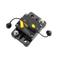 Angled view of circuit breaker showing sturdy black housing and stainless steel terminals