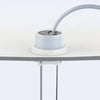 Tank level sensor installed through a tank wall using outside mounting configuration