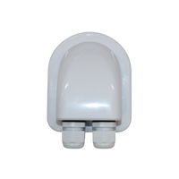 Top-down view of white cable entry cover highlighting rounded aerodynamic shape and rear dual glands