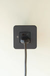 Black USB-A cable plugged into the bottom port of a Scanstrut TILE socket