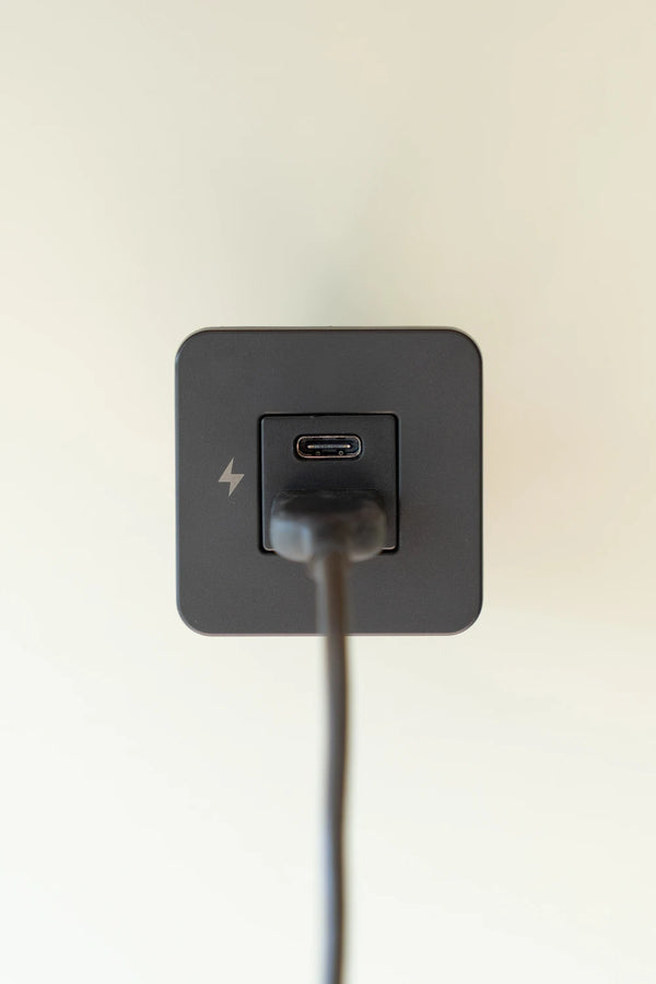 Black USB-A cable plugged into the bottom port of a Scanstrut TILE socket