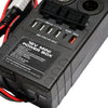 Close-up of power hub showing specification label and open USB charging ports