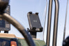 Wireless phone charger mounted on a vehicle dashboard for outdoor use
