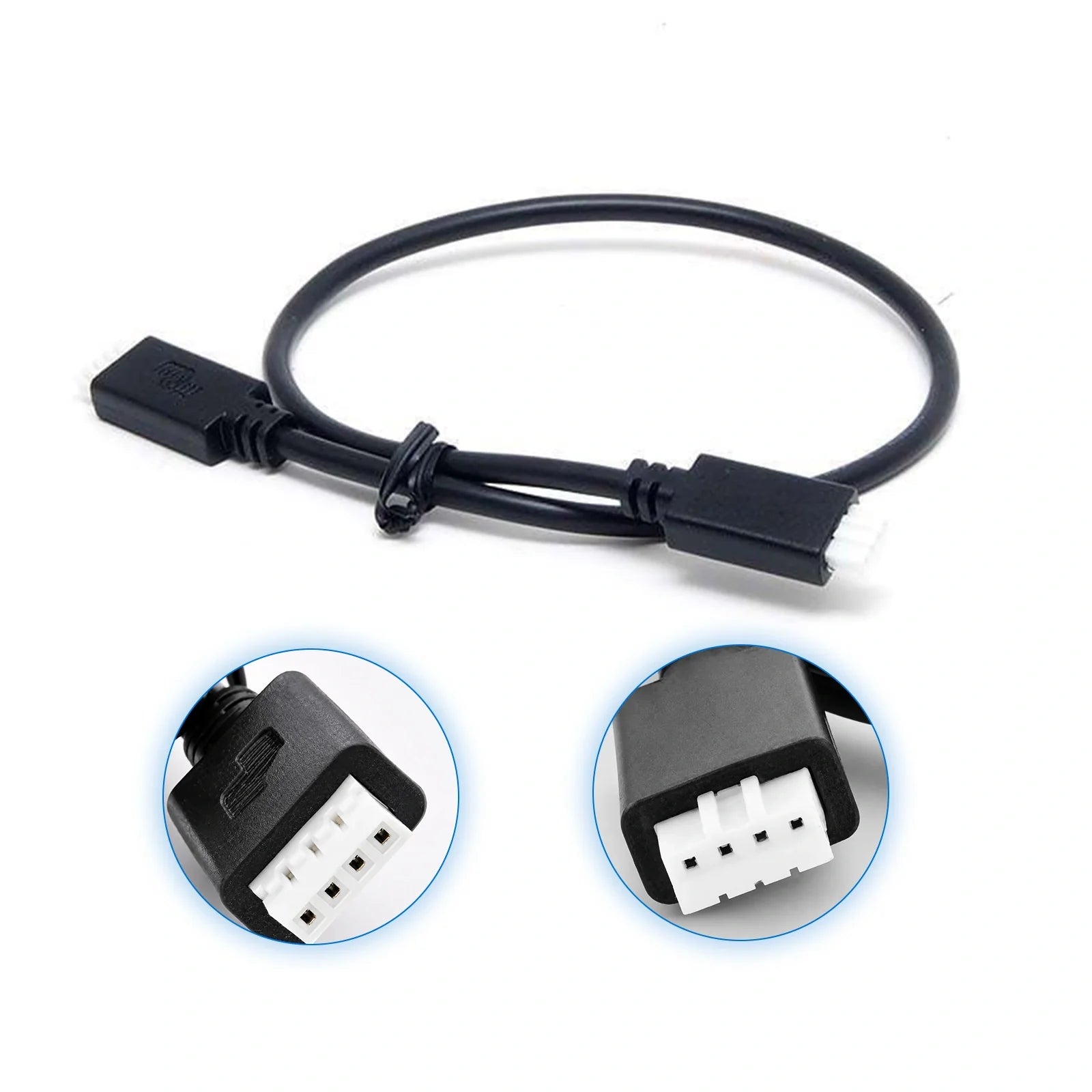 Close up of Coiled 0.3m black VE.Direct cable with 4-pin white connectors