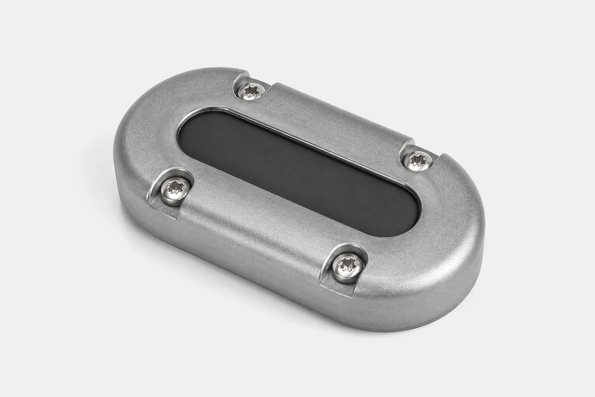 Empty aluminium vertical multi cable seal showing the internal rubber bung and mounting holes