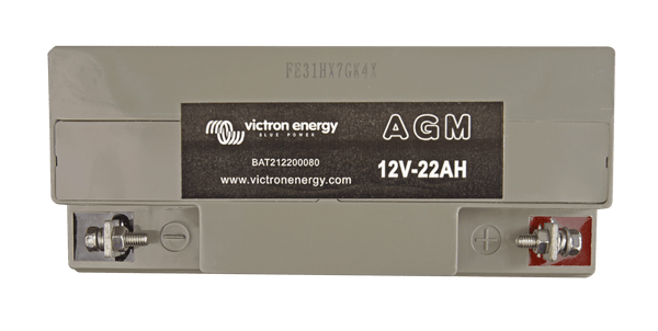 Top-down view of Victron AGM battery showing positive and negative screw terminals and polarity markings