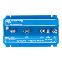 Top view of the battery isolator casing showing terminal labels and LED indicator